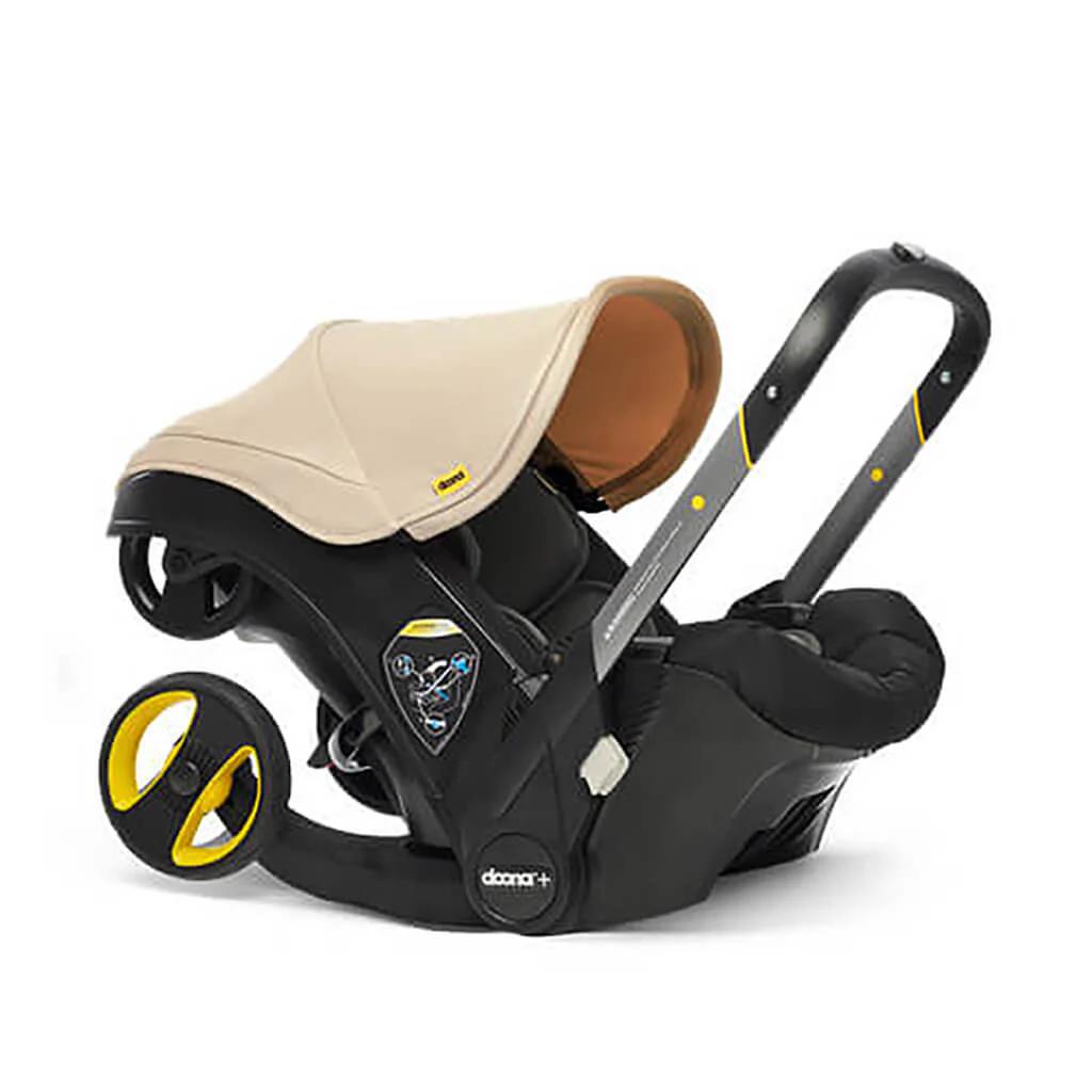 Doona Infant Car Seat & Stroller Travel System - Sahara Sand - Premium Convenience