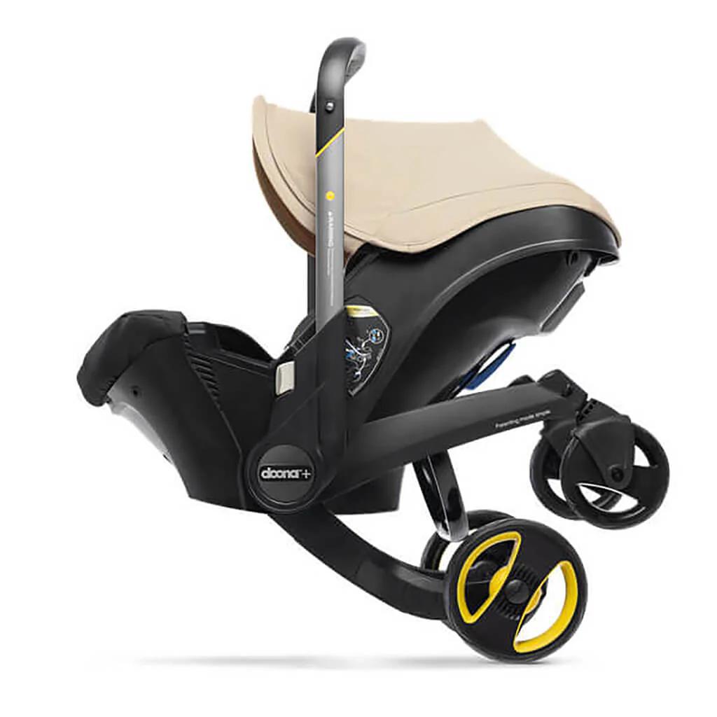Doona Infant Car Seat & Stroller Travel System - Sahara Sand - Safe & Comfortable from Day One